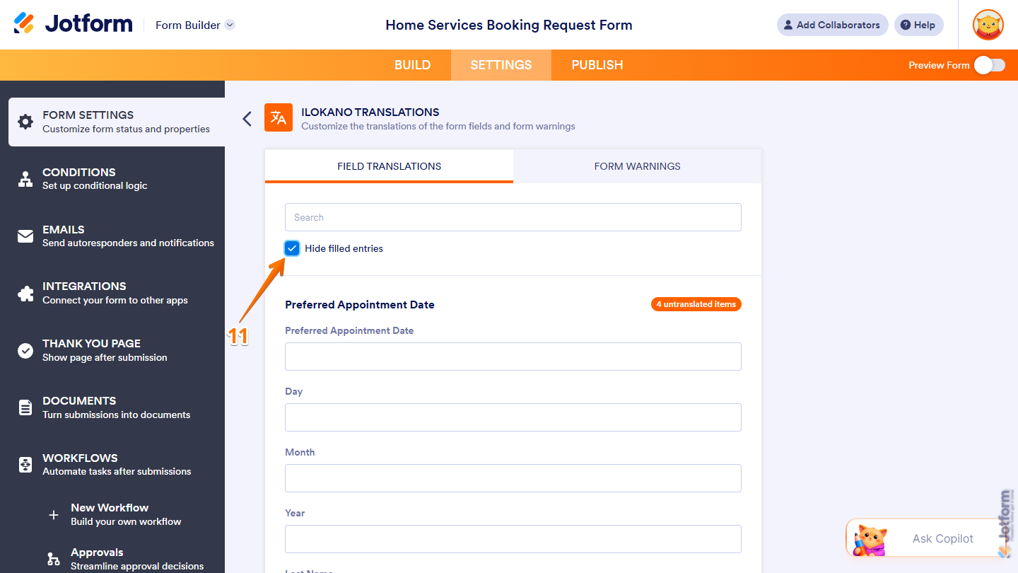 Hide Filled Entries checkbox under the Field Warnings tab in the language editor under the Form Settings tab in Jotform Form Builder