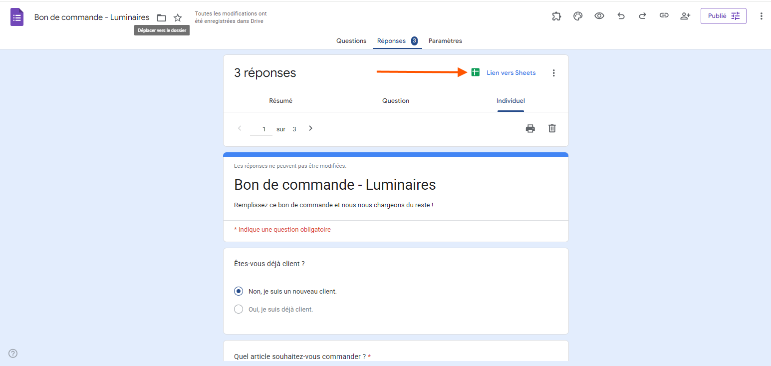 Capture d'écran de l'onglet Réponses dans Google Forms avec une flèche pointant sur Lien vers Sheets
