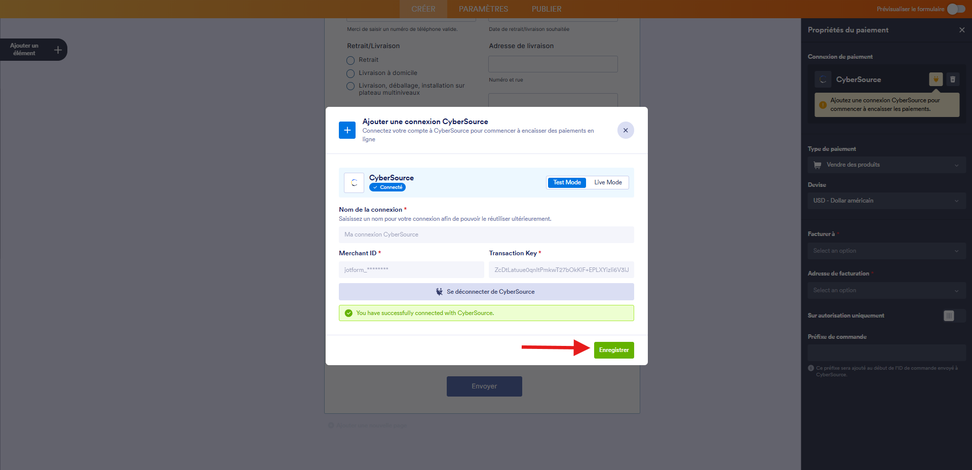 Capture d'écran de la fenêtre modale Ajouter une connexion CyberSource dans le Générateur de formulaires Jotform avec une flèche vers le bouton Enregistrer une fois la connexion établie