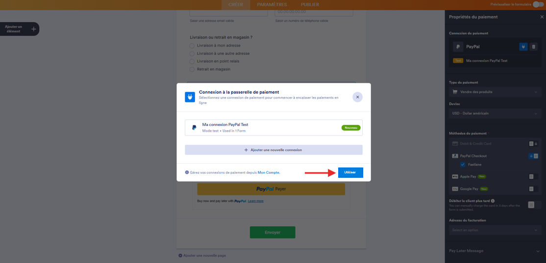 Capture d'écran de la fenêtre modale Connexion à la passerelle de paiement dans le Générateur de formulaires Jotform avec une flèche vers le bouton Utiliser