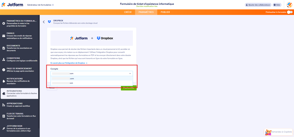 Capture d'écran de la page d'intégration Jotform + Dropbox dans le Générateur de formulaires Jotform avec un encadré autour de la liste déroulante des comptes enregistrés