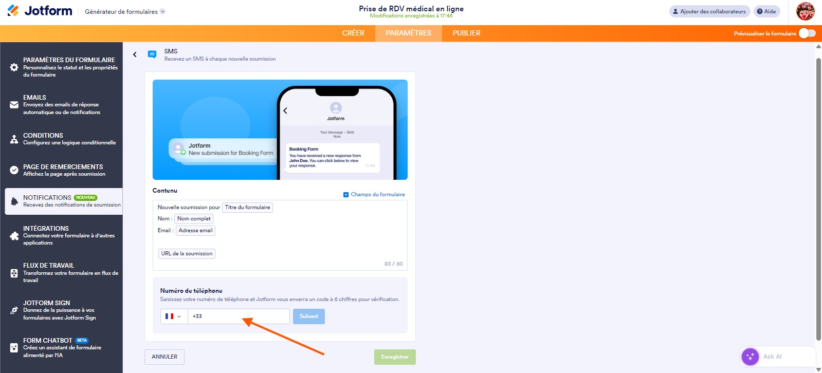 Capture d'écran de la page SMS dans le Générateur de formulaires Jotform avec une flèche pointant vers le champ de saisie d'un numéro de téléphone 