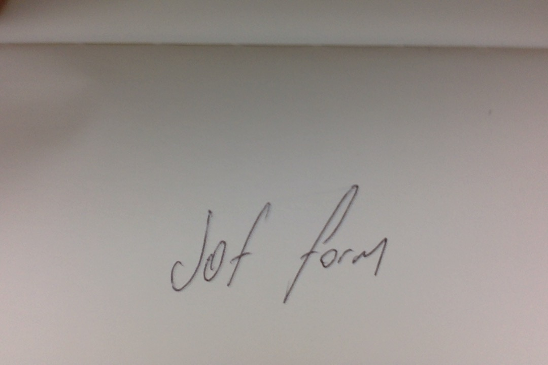 Machen Sie ein ruhiges und deutliches Foto Ihrer Unterschrift auf einem Blatt Papier