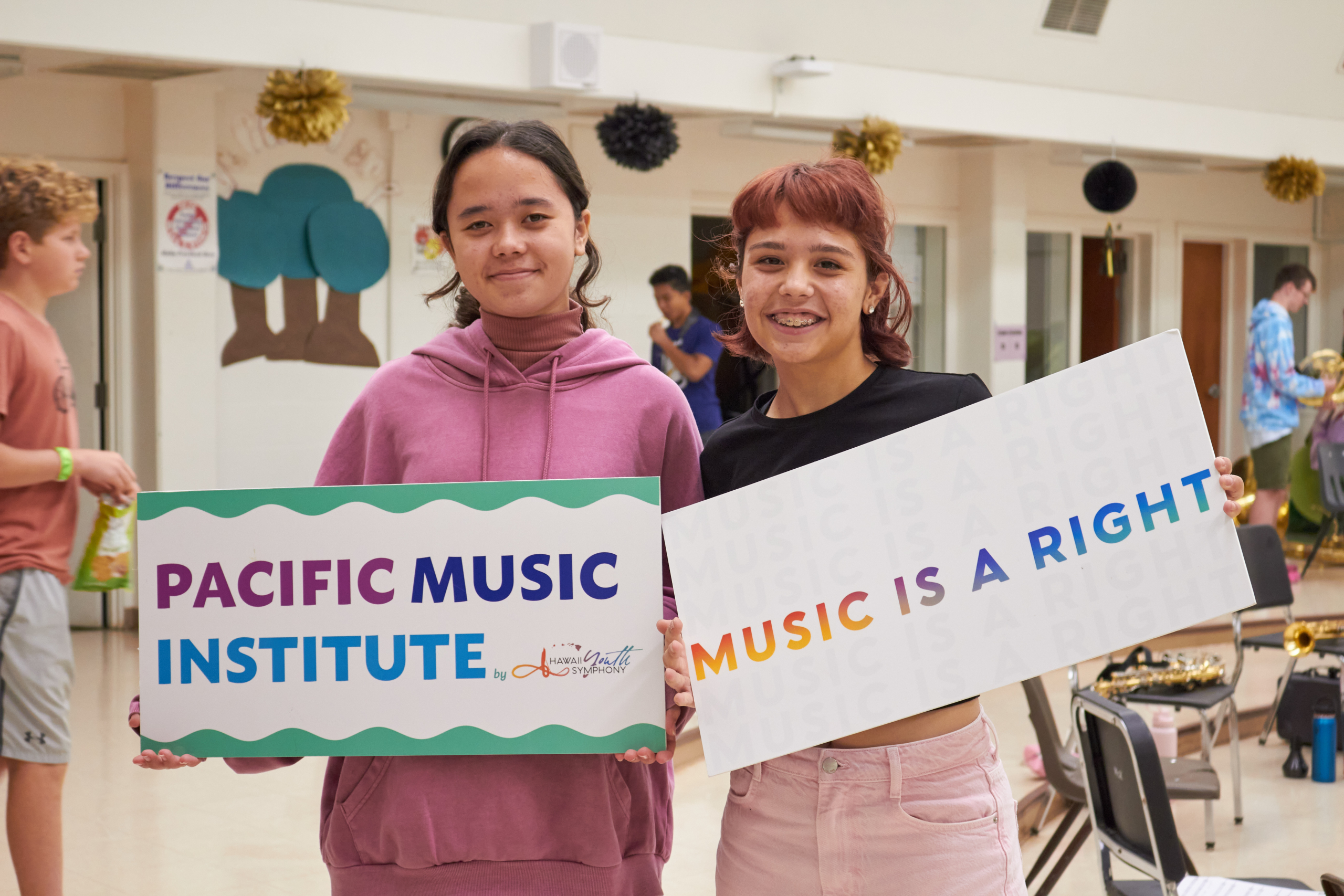 Image of two children participated in Pacific Music Institute program