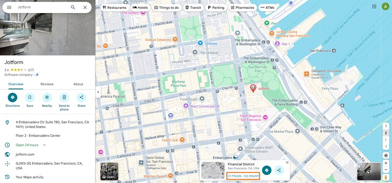 Screenshot of Google Maps displaying a city map with a red location pin placed, showing surrounding streets and landmarks