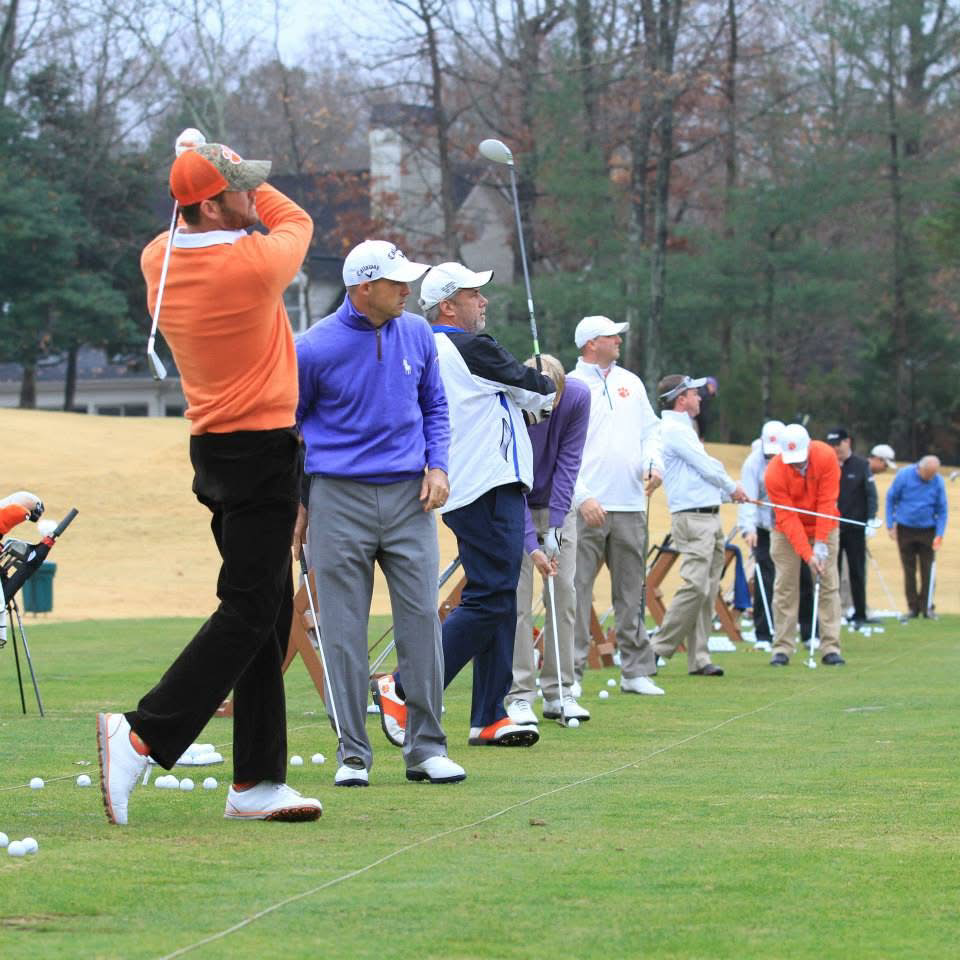 Image of people playing golf