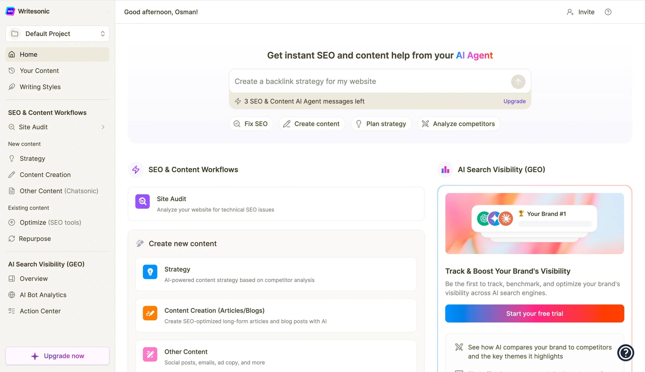 Writesonic dashboard with SEO and content workflow tools and an AI prompt input box for generating content