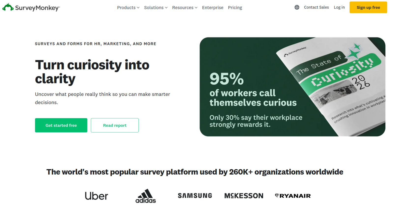 Screenshot of the SurveyMonkey landing page, showing a headline "Turn curiosity into clarity"